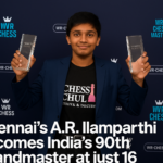 Chennai’s 16-year-old A.R. Ilamparthi celebrates becoming India’s 90th Chess Grandmaster holding trophies after a championship win.