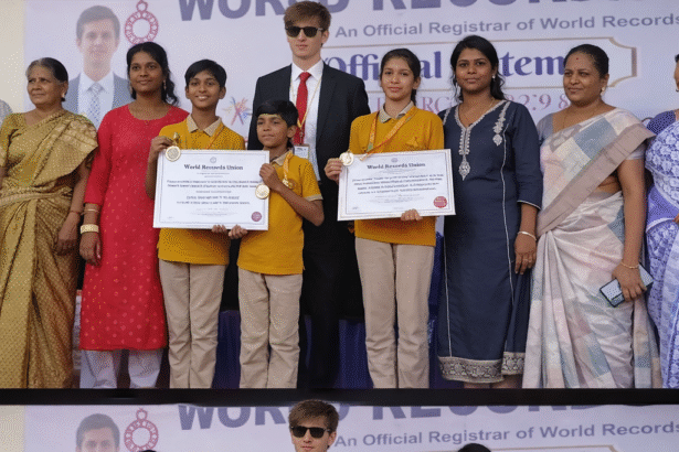 Coimbatore students performing yoga at 85 feet height to create a world record