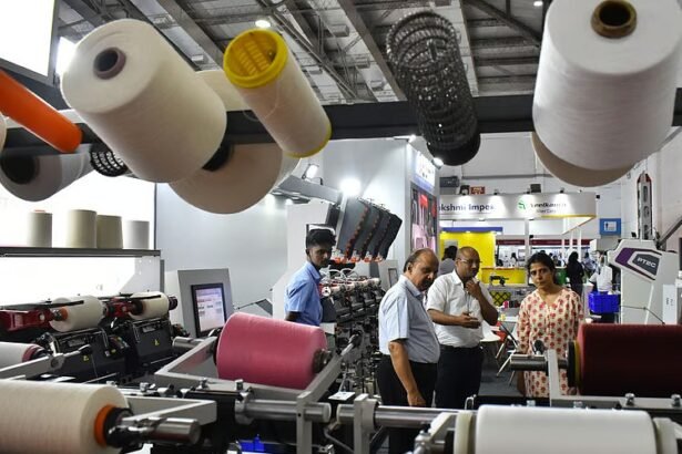 Visitors exploring advanced machinery at the Coimbatore textile accessories spares expo during SIMA Texfair 2026 at CODISSIA Trade Fair Complex
