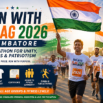 Participants running with Indian flags during Run With Flag 2026 Coimbatore patriotic marathon event