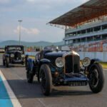 The cast and crew of the film GDN launch the trailer at Coimbatore's motorsports circuit surrounded by vintage cars.