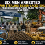Police personnel investigating alleged silver-laced soil excavation inside the Hindustan Photo Films factory premises in the Nilgiris.