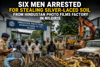 Police personnel investigating alleged silver-laced soil excavation inside the Hindustan Photo Films factory premises in the Nilgiris.