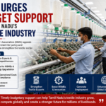 Textile workers operating spinning machines inside a modern textile mill in Coimbatore, representing Tamil Nadu's textile manufacturing industry.